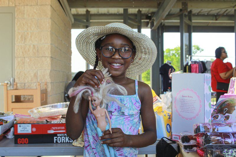 Historic Black town swaps white dolls at Juneteenth celebration